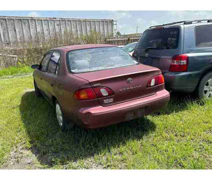 2000 Toyota Corolla for sale is a Red 2000 Toyota Corolla Car for Sale in Okeechobee FL