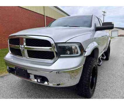 2014 Ram 1500 Quad Cab for sale is a Silver 2014 RAM 1500 Model Car for Sale in Greensboro NC