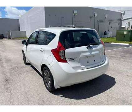 2014 Nissan Versa for sale is a Tan 2014 Nissan Versa 1.6 Trim Car for Sale in Hallandale Beach FL