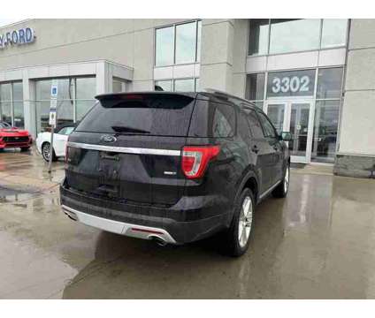 2016UsedFordUsedExplorerUsed4WD 4dr is a Black 2016 Ford Explorer XLT Car for Sale in Fargo ND