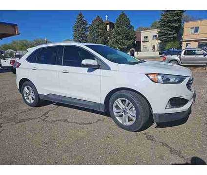 2020 Ford Edge AWD SEL is a White 2020 Ford Edge Car for Sale in Raton NM
