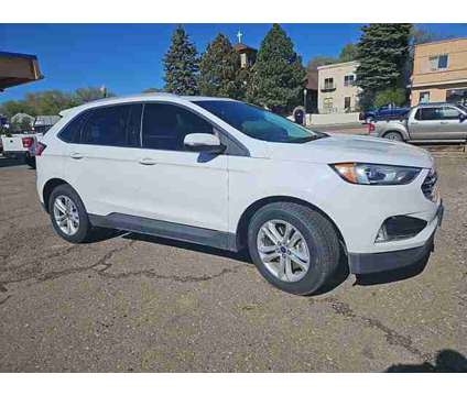 2020 Ford Edge AWD SEL is a White 2020 Ford Edge Car for Sale in Raton NM