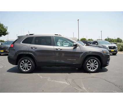 2019 Jeep Cherokee Latitude Plus is a Grey 2019 Jeep Cherokee Latitude Car for Sale in Georgetown TX
