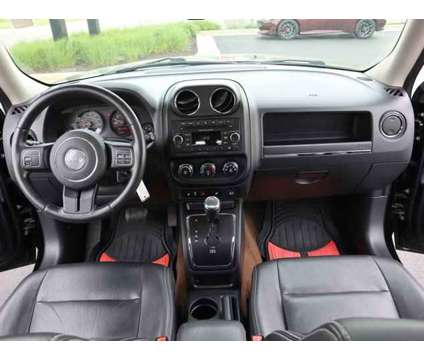 2015 Jeep Patriot High Altitude Edition 4WD is a Black 2015 Jeep Patriot High Altitude Car for Sale in Rockford IL