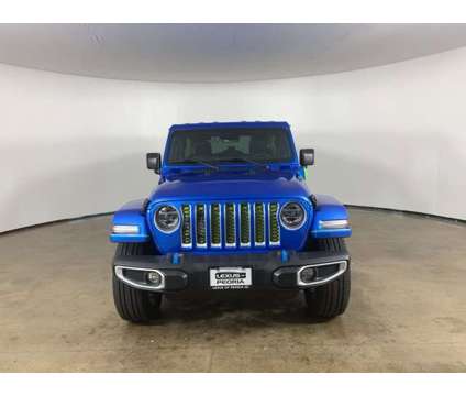 2022 Jeep Wrangler Unlimited Sahara 4xe is a Blue 2022 Jeep Wrangler Unlimited Car for Sale in Peoria IL