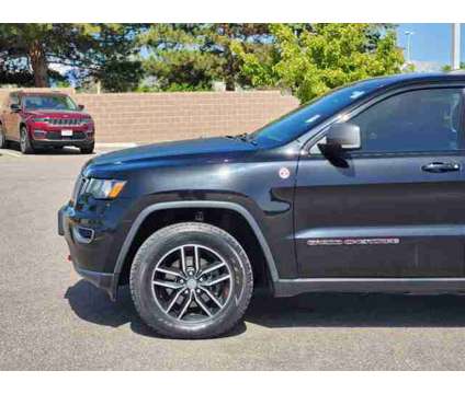 2017 Jeep Grand Cherokee Trailhawk is a Black 2017 Jeep grand cherokee Trailhawk Car for Sale in Denver CO