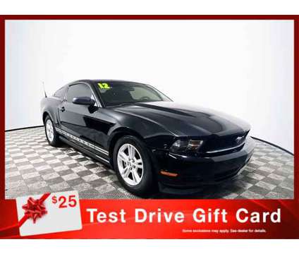 2012 Ford Mustang V6 Premium is a Black 2012 Ford Mustang V6 Car for Sale in Tampa FL