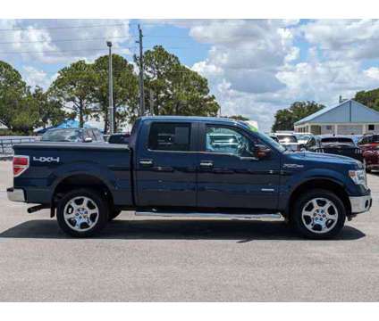2014 Ford F-150 XLT is a Blue 2014 Ford F-150 XLT Car for Sale in Sarasota FL