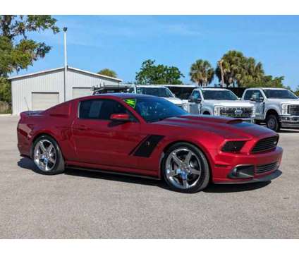 2014 Ford Mustang GT Premium is a Red 2014 Ford Mustang GT Car for Sale in Sarasota FL