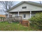 Foreclosure Property: W 3rd St