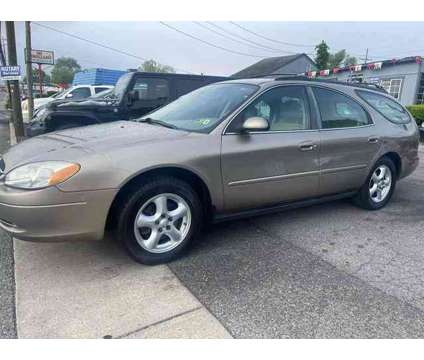 2003 Ford Taurus for sale is a Tan 2003 Ford Taurus Car for Sale in Ranson WV