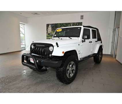 2017 Jeep Wrangler Unlimited Sahara is a White 2017 Jeep Wrangler Unlimited Sahara SUV in Merrimack NH
