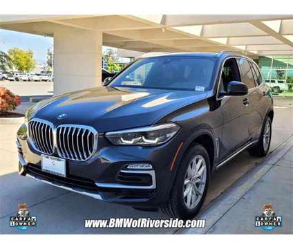 2021 BMW X5 sDrive40i is a Black 2021 BMW X5 3.0si SUV in Riverside CA