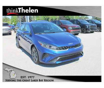 2024 Kia Forte LXS is a Blue 2024 Kia Forte LX Sedan in Bay City MI