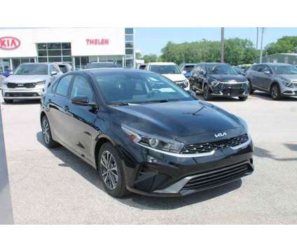 2024 Kia Forte LXS is a Black 2024 Kia Forte LX Sedan in Bay City MI