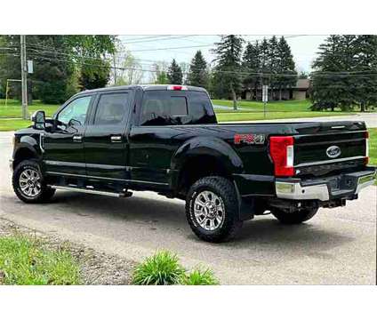 2017 Ford F-350SD Lariat is a Black 2017 Ford F-350 Lariat Truck in Ortonville MI