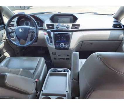 2015 Honda Odyssey Touring is a Red 2015 Honda Odyssey Touring Car for Sale in Rosenberg TX