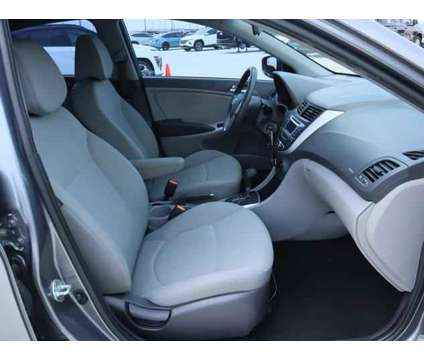2014 Hyundai Accent GLS is a Grey 2014 Hyundai Accent GLS Sedan in Friendswood TX