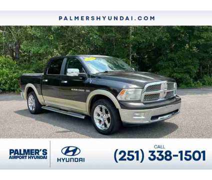 2011 Ram 1500 Laramie is a Brown 2011 RAM 1500 Model Laramie Truck in Mobile AL