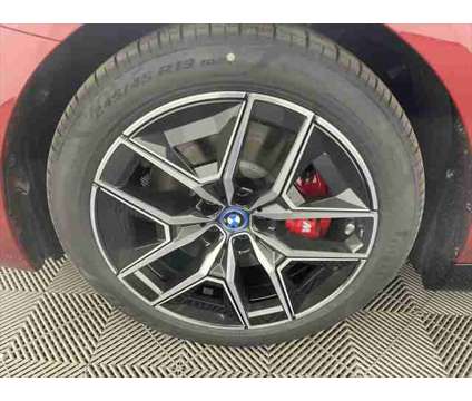 2025 BMW i5 xDrive40 is a Red 2025 Sedan in Freeport NY