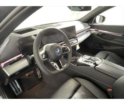 2025 BMW i5 xDrive40 is a Black 2025 Sedan in Freeport NY