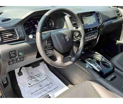 2023 Honda Passport AWD Elite is a Grey 2023 Honda Passport SUV in Granbury TX