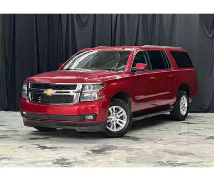 2015 Chevrolet Suburban for sale is a Red 2015 Chevrolet Suburban 1500 Trim Car for Sale in Elgin IL