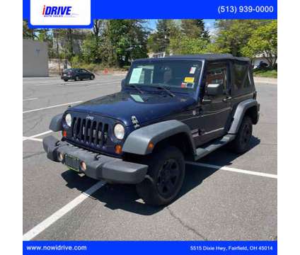 2013 Jeep Wrangler for sale is a Blue 2013 Jeep Wrangler Car for Sale in Fairfield OH