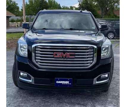 2015 GMC Yukon for sale is a Black 2015 GMC Yukon 1500 4dr Car for Sale in Saint Louis MO