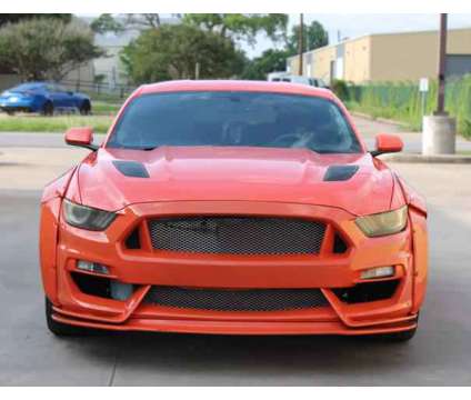 2015 Ford Mustang for sale is a Orange 2015 Ford Mustang Car for Sale in Houston TX