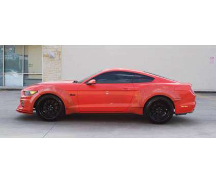 2015 Ford Mustang for sale is a Orange 2015 Ford Mustang Car for Sale in Houston TX