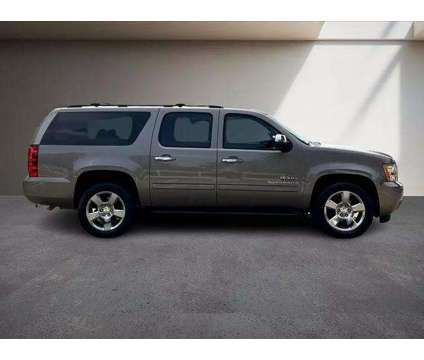 2013 Chevrolet Suburban 1500 for sale is a Brown 2013 Chevrolet Suburban 1500 Trim Car for Sale in Houston TX