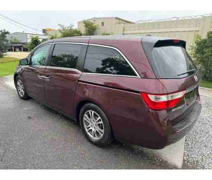 2013 Honda Odyssey for sale is a Red 2013 Honda Odyssey Car for Sale in Kenner LA