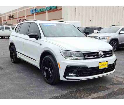 2019UsedVolkswagenUsedTiguanUsed2.0T FWD is a White 2019 Volkswagen Tiguan Car for Sale in Houston TX