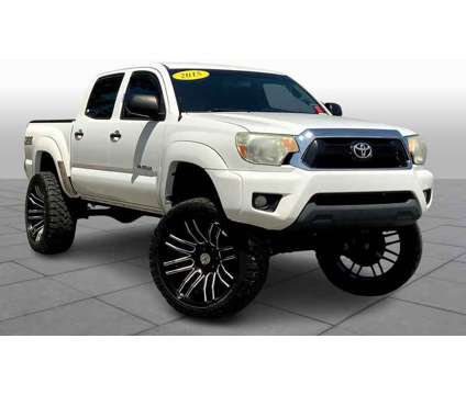 2015UsedToyotaUsedTacomaUsed2WD Double Cab V6 AT is a White 2015 Toyota Tacoma Car for Sale in Gulfport MS