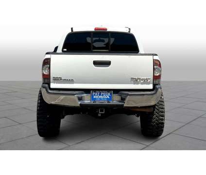 2015UsedToyotaUsedTacomaUsed2WD Double Cab V6 AT is a White 2015 Toyota Tacoma Car for Sale in Gulfport MS