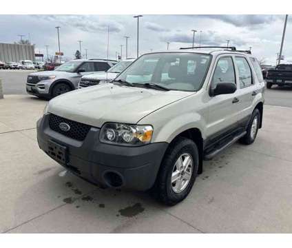 2005UsedFordUsedEscapeUsed4dr 103 WB 2.3L 4WD is a Tan 2005 Ford Escape Car for Sale in Fargo ND