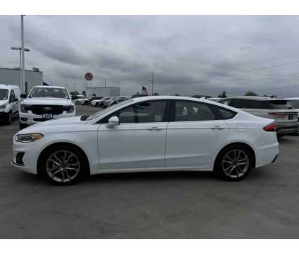 2020UsedFordUsedFusionUsedFWD is a White 2020 Ford Fusion Car for Sale in Hawthorne CA