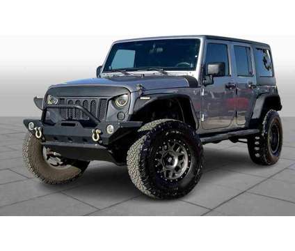 2013UsedJeepUsedWrangler UnlimitedUsed4WD 4dr is a Silver 2013 Jeep Wrangler Unlimited Car for Sale in Lubbock TX