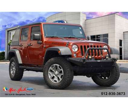 2014 Jeep Wrangler Unlimited Rubicon is a 2014 Jeep Wrangler Unlimited Rubicon Car for Sale in Georgetown TX