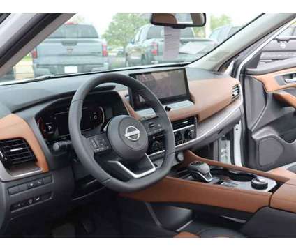 2024 Nissan Rogue Platinum is a Black, White 2024 Nissan Rogue Car for Sale in Rockford IL