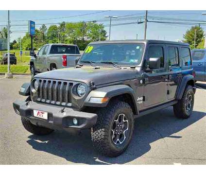 2019 Jeep Wrangler Unlimited Sport S is a Grey 2019 Jeep Wrangler Unlimited Sport Car for Sale in Sellersville PA