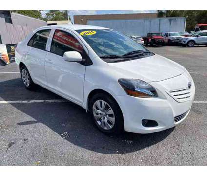 2011 Toyota Yaris for sale is a White 2011 Toyota Yaris Car for Sale in Orlando FL