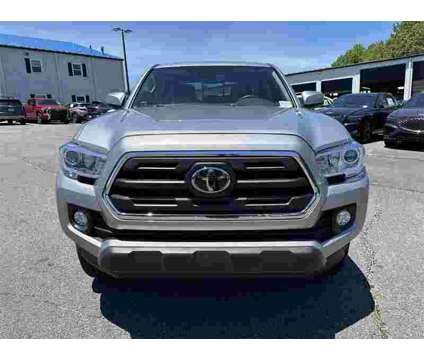 2018 Toyota Tacoma SR5 V6 is a Silver 2018 Toyota Tacoma SR5 Truck in Newnan GA