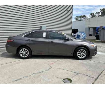 2015 Toyota Camry LE is a Grey 2015 Toyota Camry LE Sedan in Gainesville FL