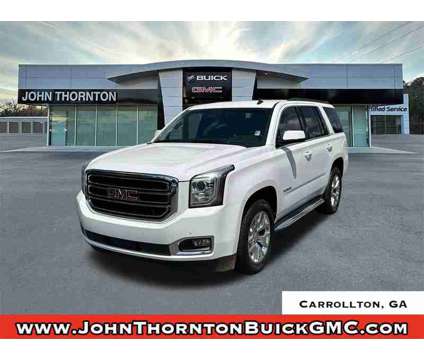 2015 GMC Yukon SLE is a White 2015 GMC Yukon SLE SUV in Carrollton GA