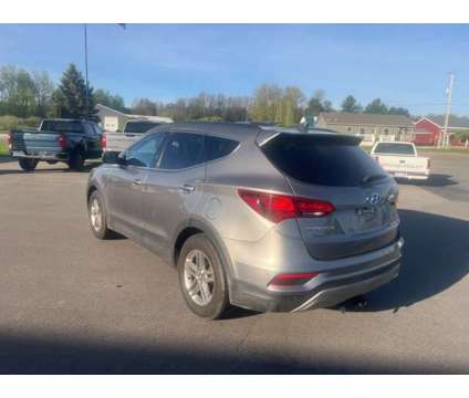 2017 Hyundai Santa Fe Sport 2.4 Base is a Grey 2017 Hyundai Santa Fe Sport SUV in Houghton Lake MI