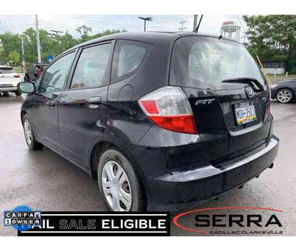 2010 Honda Fit Base is a Black 2010 Honda Fit Base Car for Sale in Clarksville TN