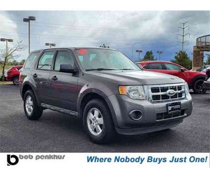 2012 Ford Escape XLS Colorado Springs Near Pueblo is a Gold 2012 Ford Escape XLS SUV in Colorado Springs CO