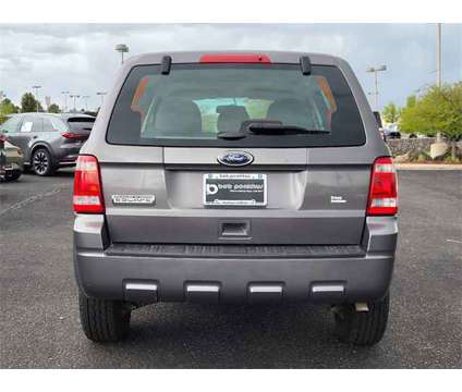 2012 Ford Escape XLS Colorado Springs Near Pueblo is a Gold 2012 Ford Escape XLS SUV in Colorado Springs CO